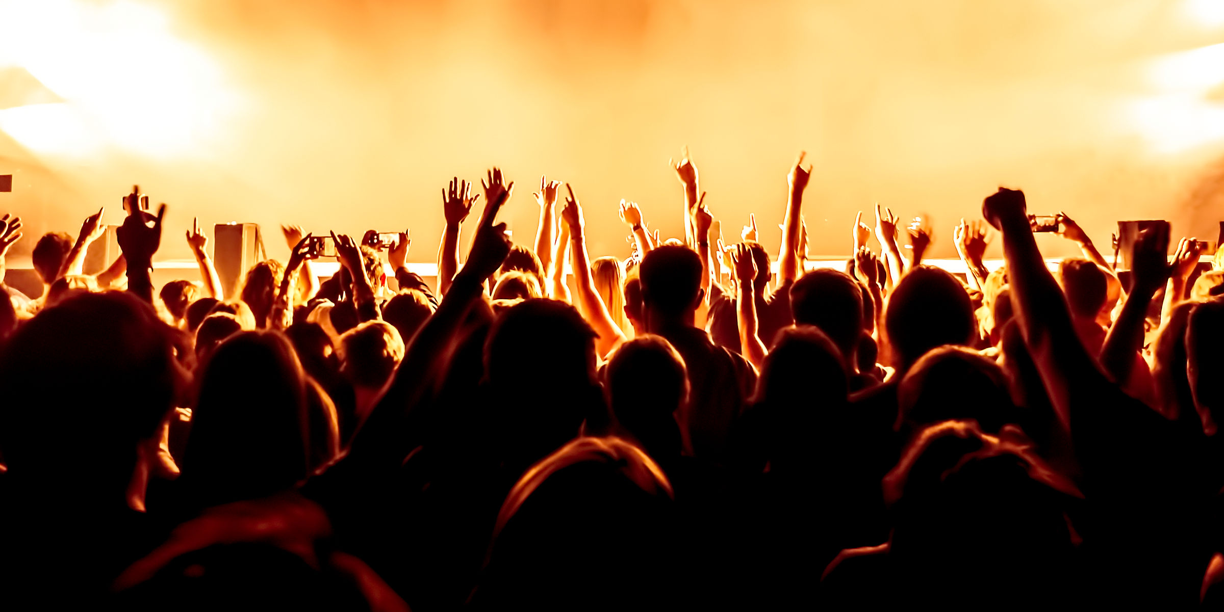 Entertainment venue crowd with water cartons